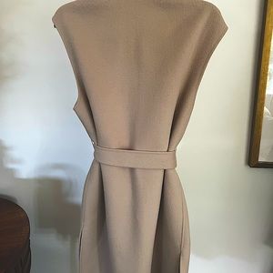 Elie Tahari sleeveless wool vest coat with fur trimmed pockets and belt.